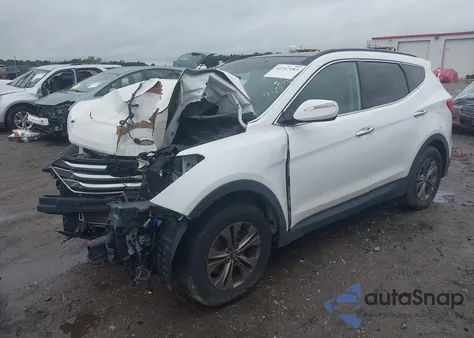 2014 Hyundai Santa Fe Sport 2.4L z USA, uszkodzony, nr VIN 5XYZUDLB7EG219362